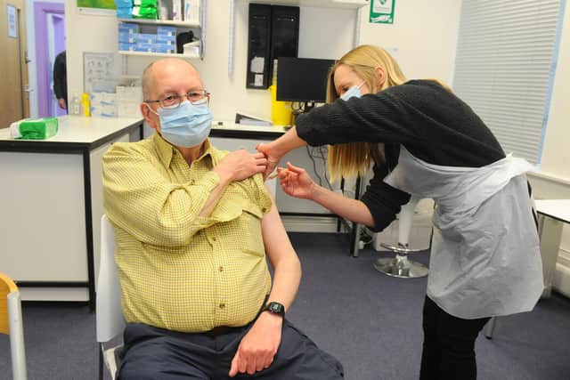 Lalys Pharmacy in Guildhall Walk, Portsmouth, Covid-19 vaccination centre.

Pictured is: Peter Knight from Bognor Regis, having his Covid-19 vaccination.

Picture: Sarah Standing (110221-2811)