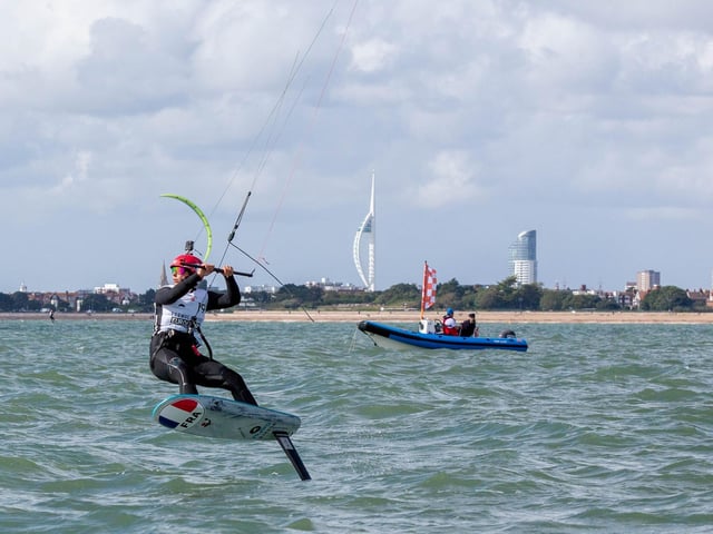 The Formula Kite European Championships start in Portsmouth, Southsea on Thursday 21st September 2023Pictured: Competitior sailing past Spinnaker TowerPicture: Habibur Rahman