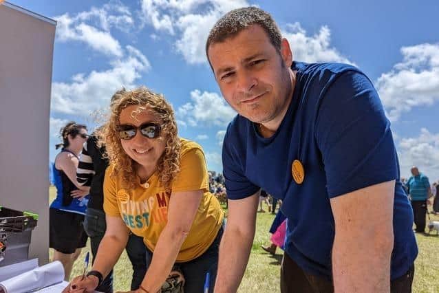 Portsmouth Lib Dem councillors Dave Ashmore and Suzy Horton, signing the petition calling for an extension to the conversion therapy ban