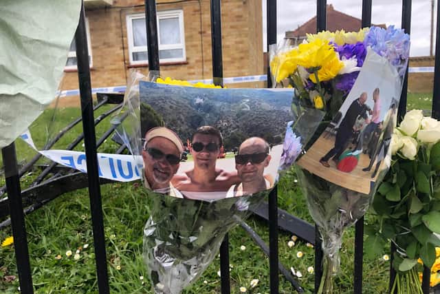 Photos were left alongside the flowers tied to the railings at the scene.