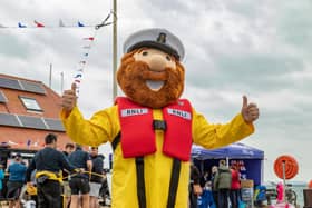 RNLI mascot 'Stormy Stan' at the open day at Langstone Harbour. The RNLI welcomed the public to showcase what they do on a day to day basis. Picture: Mike Cooter (310824)