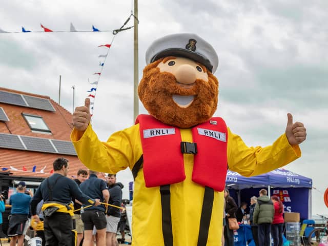 RNLI mascot 'Stormy Stan' at the open day at Langstone Harbour. The RNLI welcomed the public to showcase what they do on a day to day basis. Picture: Mike Cooter (310824)