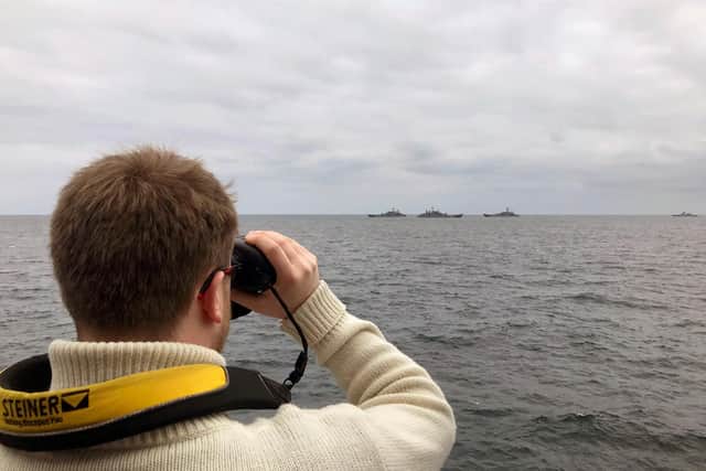 An officer on HMS Tyne monitors the Russian warships in the Channel. Photo: Royal Navy