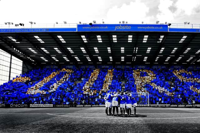 Pompey fans hold up Ours outline on opening day of season against Oxford at Fratton ParkPicture and copyright: Joe Pepler 