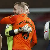 Jack Whatmough and Craig MaxGillivray embrace. Picture: Daniel Chesterton/phcimages.com