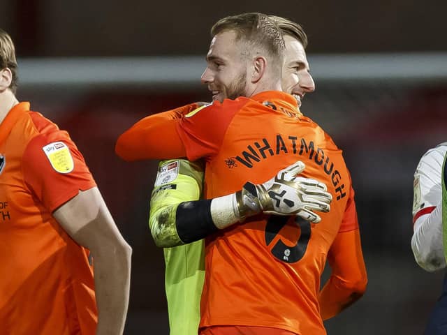 Jack Whatmough and Craig MaxGillivray embrace. Picture: Daniel Chesterton/phcimages.com