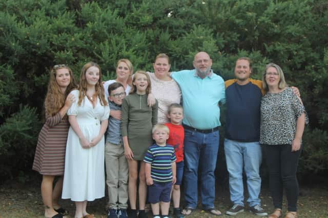 Mick Hansford surrounded by his family. Picture: Brain Tumour Research