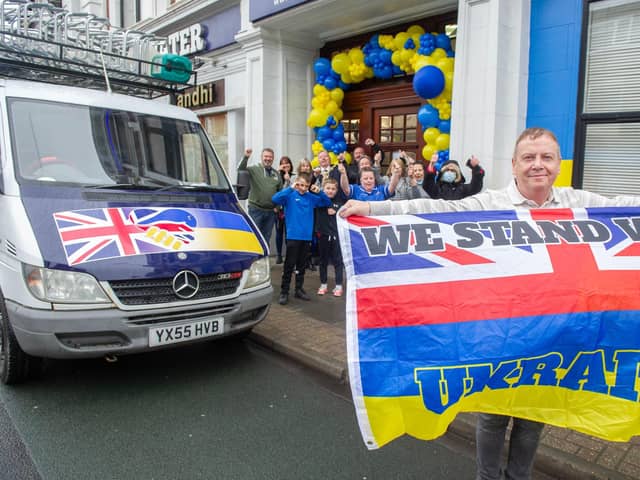 Bluewater care home owner, David Sheppard, drove a van full of supplies to Ukraine. Pictured: David Sheppard holding a flag, the Lord Mayor, Frank Jonas and his sister, the mayoress, Joy Maddox, care home staff, Radio Victory DJs, and staff of George and Dragon outside Bluewater care home, Portsmouth, on Friday April 8, 2022. Picture: Habibur Rahman.