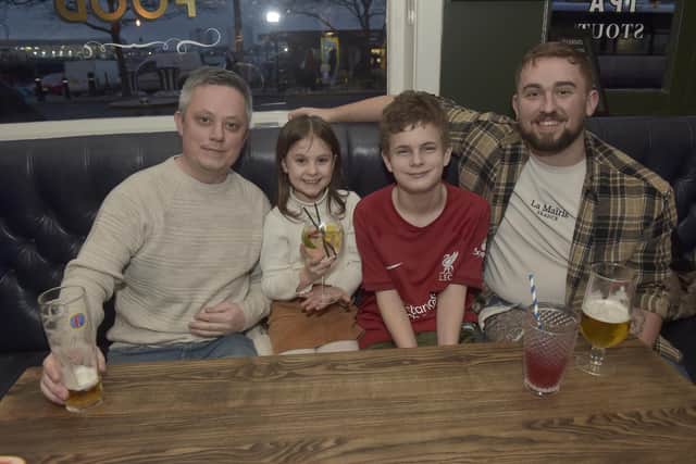 Chris Moon with his children Grace, eight, Joshua, 15, and good friend Aiden Wilkins
(170223-9754)