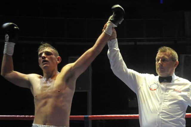 Liam Griffiths, left, hopes his hand will be raised on Friday night in front of his home Portsmouth supporters on South Parade Pier Picture: Mick Young