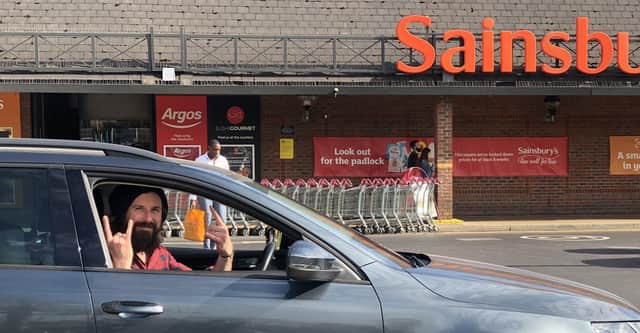 Gareth Wild in his car at the Sainsbury's in Bromley after completing a six-year challenge to park in every car parking space at his local Sainsbury's. Picture by PA