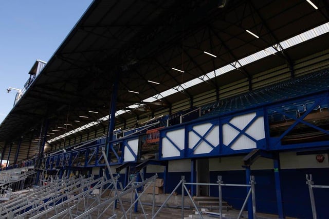 In recent times, the distinctive blue and white truss spanning the centre of the South Stand has been obscured by advertising hoardings and corporate hospitality. Now, upon the insistence of chairman Michael Eisner, the structure built in 1925 is revisiting its distinguished past.

Picture: Habibur Rahman