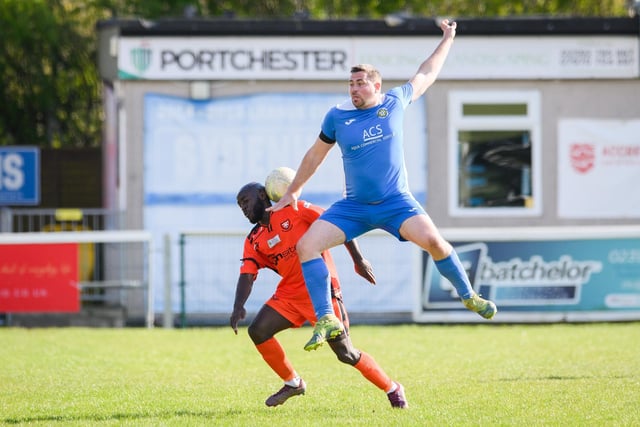 Action from the 2-2 draw between AFC Portchester under-23s (orange and black kit) and Liphook United. Picture: Keith Woodland (150421-1002)