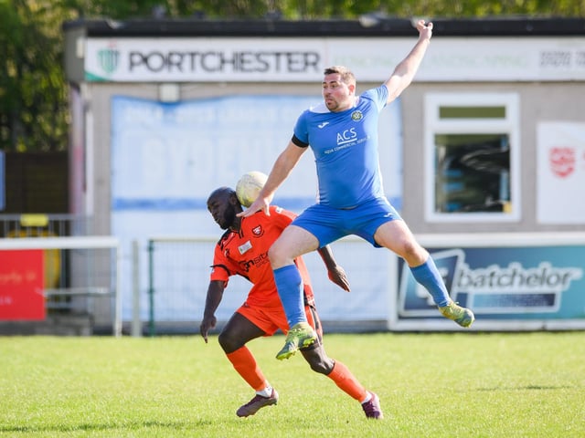 Action from the 2-2 draw between AFC Portchester under-23s (orange and black kit) and Liphook United. Picture: Keith Woodland (150421-1002)