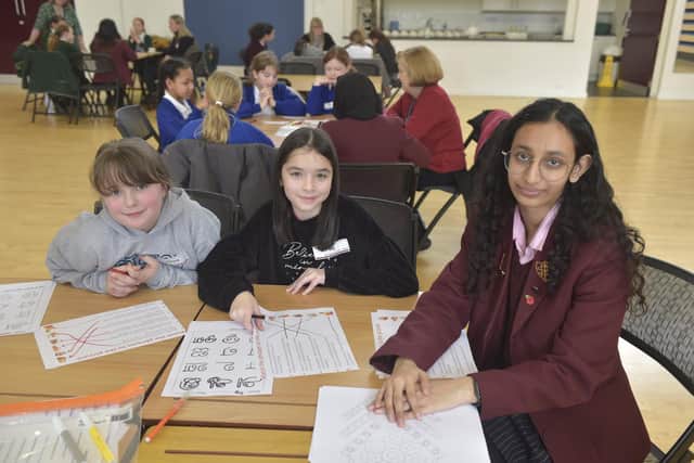 Pictured is: (l-r) Olivia Grant (10) and Ivy Fogerty from Springwood Junior School with Khushi Patel from Portsmouth High School.
Picture: Sarah Standing (030223-8999)
