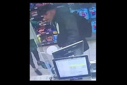 Portsmouth police want to speakto this man in connection with a shoplifting incident at the Morrisons petrol garage on Portsmouth Road, on Thursday, January 7.
