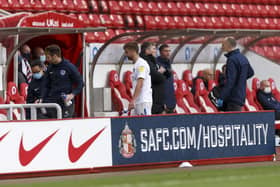 Michael Jacobs goes off injured at Sunderland (Photo by Daniel Chesterton/phcimages.com)