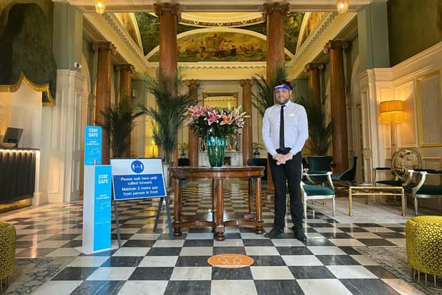 Queens Hotel duty manager, Elliott Cottrell, in the lobby. Picture: Queens Hotel.