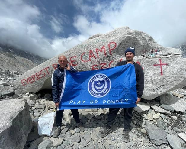 Pompey kitman Shaun North, left, and son Shane at Mount Everest Base Camp before they were left stranded on the mountain for five days