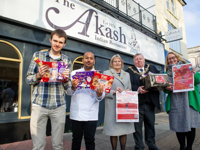 Pictured: Akash marketing manager Miles Hanmore, Owner Faz Ahmed, Lady Mayoress Mrs Joy Maddox, Lord Mayor Frank Jonas and Reverse Calender organiser, Hayley Wheeler outside the Akash restaurant with some of the donations.

Picture: Habibur Rahman