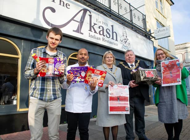 Pictured: Akash marketing manager Miles Hanmore, Owner Faz Ahmed, Lady Mayoress Mrs Joy Maddox, Lord Mayor Frank Jonas and Reverse Calender organiser, Hayley Wheeler outside the Akash restaurant with some of the donations.

Picture: Habibur Rahman