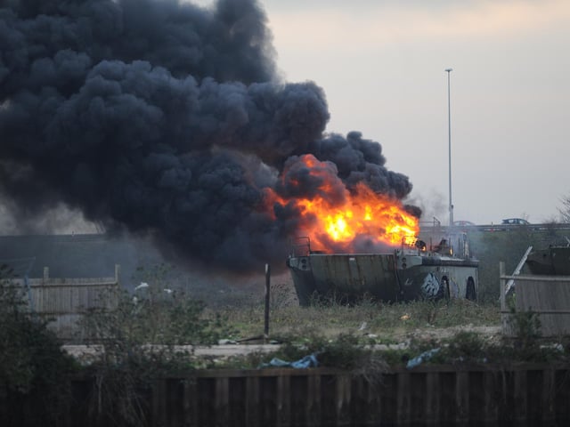A military vehicle on fire at the Pounds yard in Portsmouth. 26th November 2011. Picture: Ian Hargreaves 103873-1
