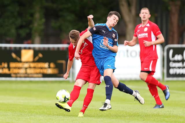 Horndean (red) v Hartley Wintney. Picture: Chris Moorhouse
