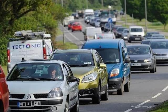 Queuing traffic. There are rules on when car horns can be sounded - and whether they must be working or not