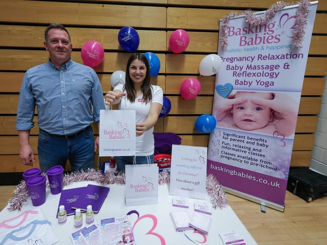 Jason Swepson and Cassie Mitchell on the Basking Babies stand at the HTC Christmas Fayre 2024. Picture: Chris Moorhouse (161124-47)