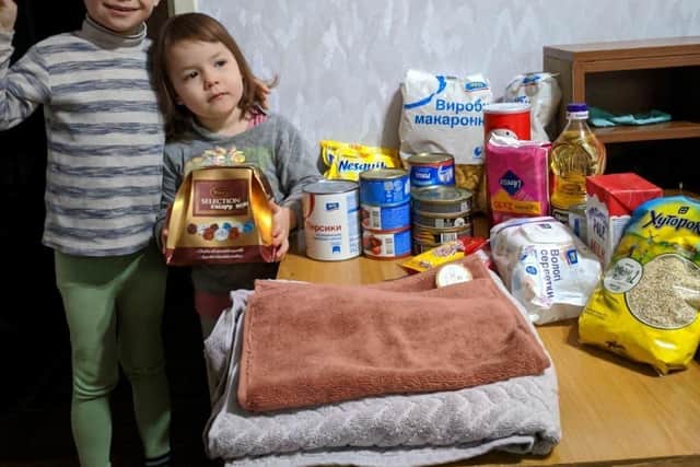 Youngsters with donations. Picture: Jack Ross