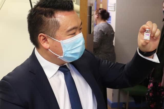 Alan with a vial of the AstraZeneca / Oxford University Coronavirus Vaccine. Picture: Office of Alan Mak