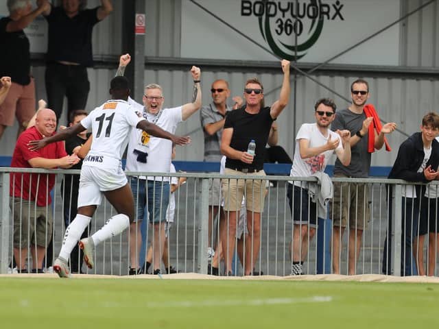 Hawks fans celebrate Roarie Deacon's goal against Welling on on the opening day of the 2019/20 season. Photo by Dave Haines.