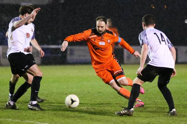 Brett Pitman runs at the Pagham defence last night. Picture by Nathan Lipsham