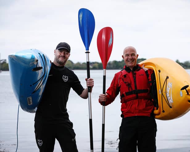 Tony Hewitt, left, and  Stu Paine set off to canoe around Portsea Island, raising money for the RNLI, as part of the Mayday Mile Challenge. They are pictured at Port Solent where they started
Picture: Chris Moorhouse (jpns 140521-08)