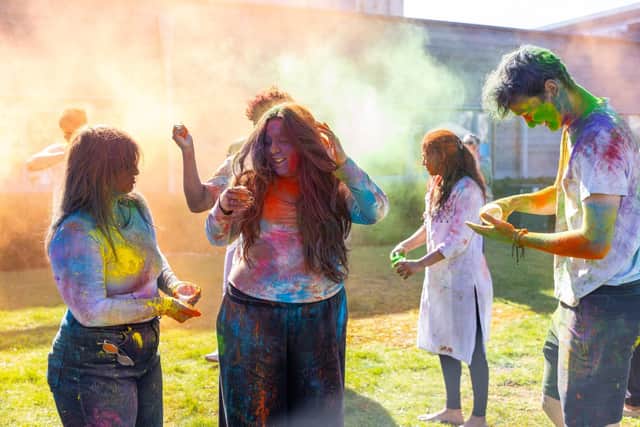 Students and Staff taking part in the Holi Colour Run event at One World Festival