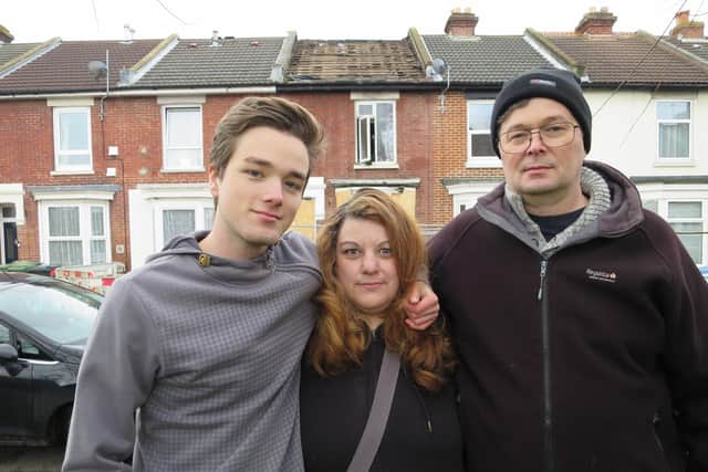 Michael McCormick with his wife Montse and their son Mark outside their destroyed home in Whale Island Way in Stamshaw, Portsmouth, on January 3 after a New Year's Day suspected gas explosion forced them to flee. Picture: Ben Fishwick
