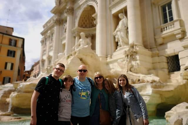 Matt Milham and Tracie Bruno from Stubbington had to postpone their wedding for a year due to coronavirus restrictions, but their friends pulled out all the stops to make sure they marked the original date. Pictured: Matt and Tracie with their children Thomas, Alfie, Emily and Olivia