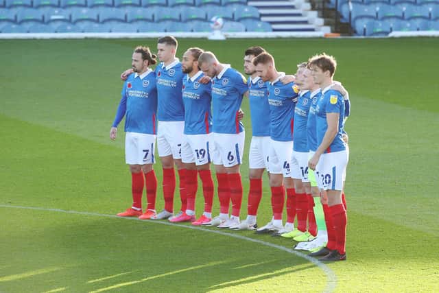 The Pompey players with poppies on their shirts against Charlton