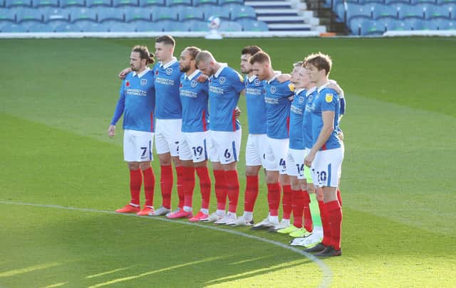 The Pompey players with poppies on their shirts against Charlton