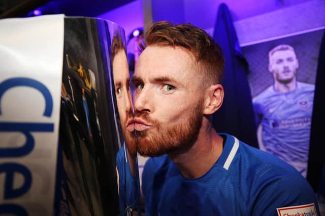 Tom Naylor celebrates with the Checkatrade Trophy