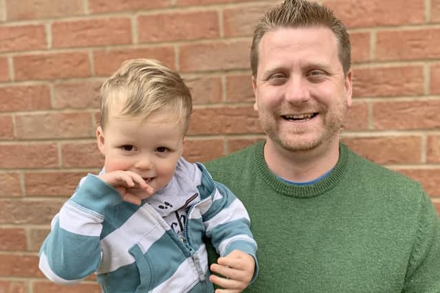 Pictured is: Jack Williams with his son Caleb.
