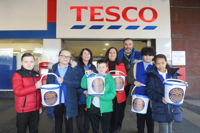 Pupils from Arundel Court Primary Academy were fundraising with collection buckets at Tesco in Crasswell Street after their nursery was vandalised causing £20,000 of damage. Pictured (left to right) Reggie Stewart, 10, Maddison Shorthouse, 10, Jacqueline Lancaster, teaching assistant, Vinnie Thompson, 10, Maria Camilleri, checkout team support at Tesco, Dom Chapman, pastoral support worker at the academy, Bow-Anne Shanahan, 10, and Daniella Uzoamaka ,9.

Picture: Sarah Standing
