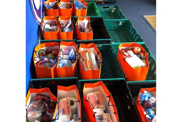 Pompey in the Community has been awarded £70,000 from Defra to keep feeding Portsmouth people affected by the pandemic. Pictured: Some of the food parcels ready to go