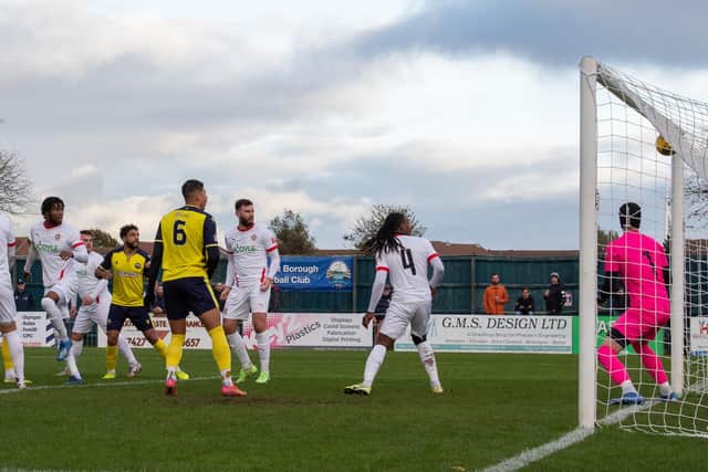 Ryan Woodford's header gives Gosport the lead against Beaconsfield. Picture: Colin Farmery