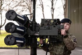 A Gunner from 170 Battery, 12 Regiment Royal Artillery stands with the High Velocity Missile (HVM) Lightweight Multiple Launcher (LML) during a demonstration held at Baker Barracks on Thorney Island. Picture: UK MOD © Crown
