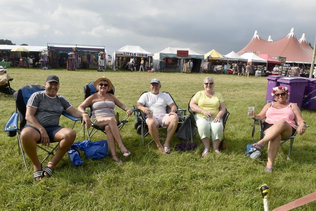 Wickham Festival 2024 got underway at their new arena site in Shedfield on Thursday, August 1. 

Pictured is: (l-r) Russell Page, Tracy Page from Bognor Regis, Billy Boxall, Christine Boxall from Chichester and Wendi Gardner from Bognor Regis. 

Picture: Sarah Standing (010824-8058)