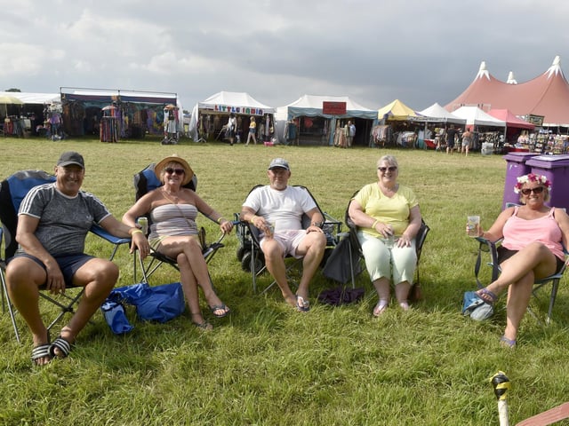 Wickham Festival 2024 got underway at their new arena site in Shedfield on Thursday, August 1. Pictured is: (l-r) Russell Page, Tracy Page from Bognor Regis, Billy Boxall, Christine Boxall from Chichester and Wendi Gardner from Bognor Regis. Picture: Sarah Standing (010824-8058)