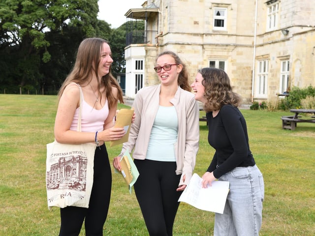 A-Level results day at King's Academy Bay House in Gosport, Hampshire.L-R Lily Giles, Sophie Hankin, Anna Jones Please credit: Paul Jacobs/pictureexclusive.com