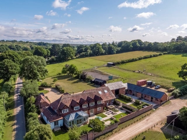 This home is set in 13 acres of countryside and it comes with four bedrooms, four bathrooms and four reception rooms.