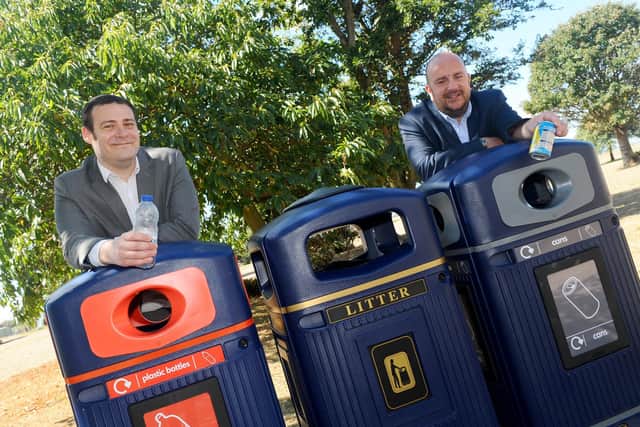 Portsmouth City Council is launching the second part of its 'Don't be a din, put it in the bin' campaign unveiling new recycling bins around Southsea Common.
Pictured is: (l-r) Councillors Dave Ashmore, cabinet member for environment and climate change and Steve Pitt, deputy leader of Portsmouth City Council with the new recycling bins.
Picture: Sarah Standing (060820-2040)